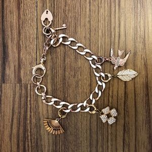 Rose Gold Fossil Charm Bracelet